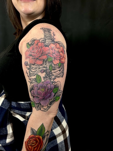 Explore maple leaf tattoo ideas, creative tattoo ideas in Salem, available at Mayhem Tattoo