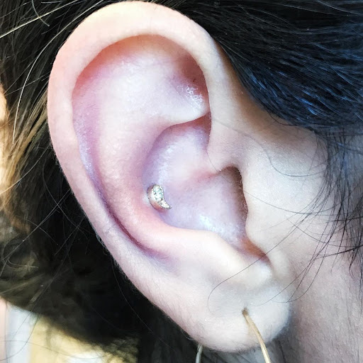 Explore cover up black tattoo ideas, creative tattoo ideas in New York, available at Cherry Bomb Tattoo & Piercing Studio - Walk-Ins Welcome