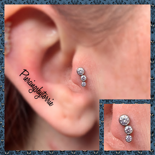 Explore afro tattoo ideas, creative tattoo ideas in Fort Walton Beach, available at Piercings by Torrie