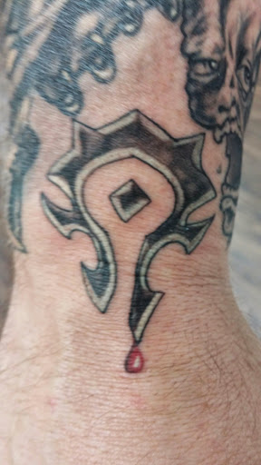 Find skull ideas sleeve tattoos for your next unique tattoo in Orange at Leftys Tattoo