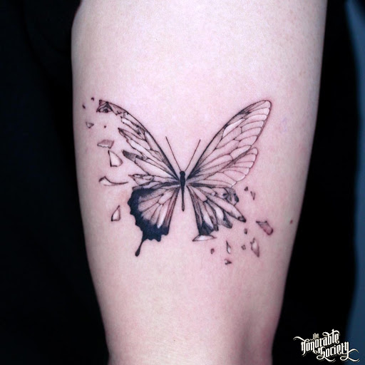 Explore black hole tattoo ideas, creative tattoo ideas in West Hollywood, available at The Honorable Society Tattoo Shop