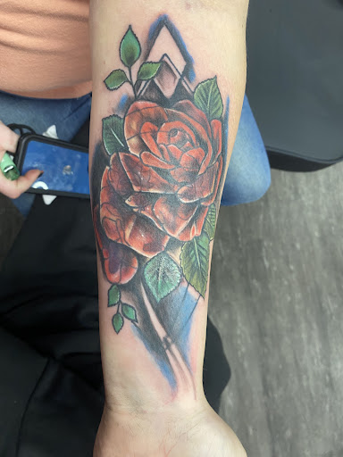 Find rib tattoo ideas for females for your next unique tattoo in Fort Wayne at Renteria Tattoo Co.