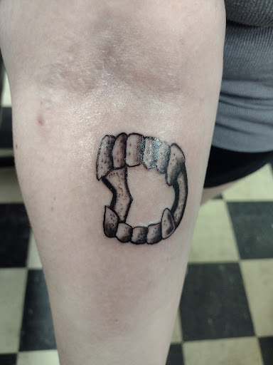 Explore neck name tattoo ideas, creative tattoo ideas in Owosso, available at Twisted ink tattoo