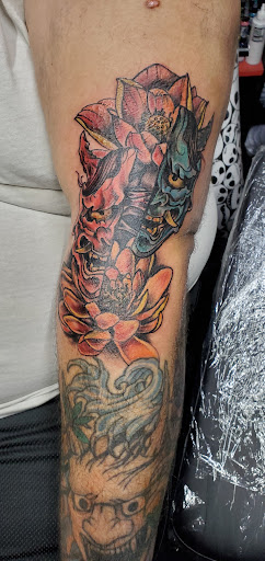 Explore cheshire cat tattoo ideas, creative tattoo ideas in Muncie, available at Obscura Tattoo shop and Oddity Collective