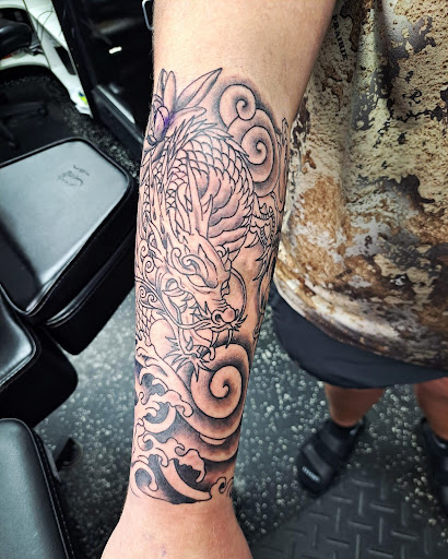 Explore belly button tattoos ideas, creative tattoo ideas in Fort Myers, available at Loyal 2 The Coil Tattoos & Piercings (Edison Mall Location Entrance F)