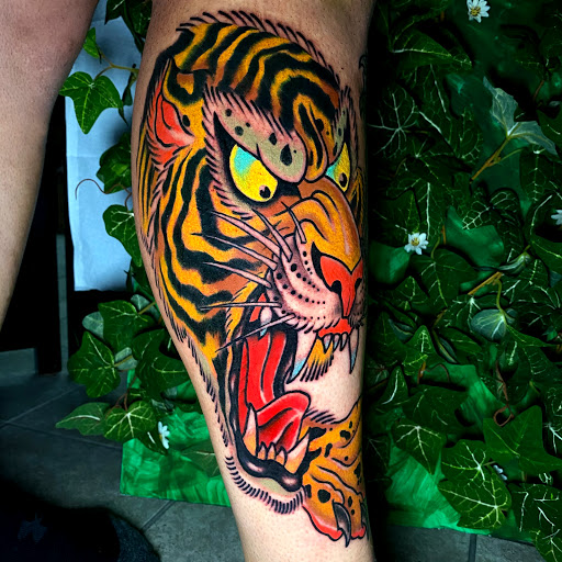 Explore men's behind the ear tattoo ideas, creative tattoo ideas in Palm Bay, available at Never Enough Tattoos