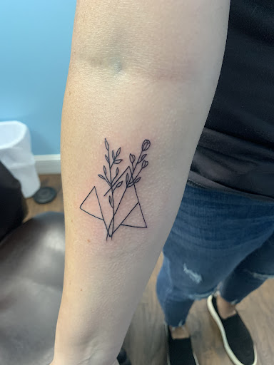 Explore women's tattoo sleeve ideas, creative tattoo ideas in Calhoun, available at Velvet Panther Tattoo and Piercing