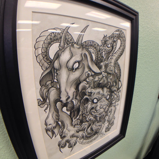 Explore tribal bear tattoo ideas, creative tattoo ideas in Fontana, available at Dark Hearts Tattoo Gallery