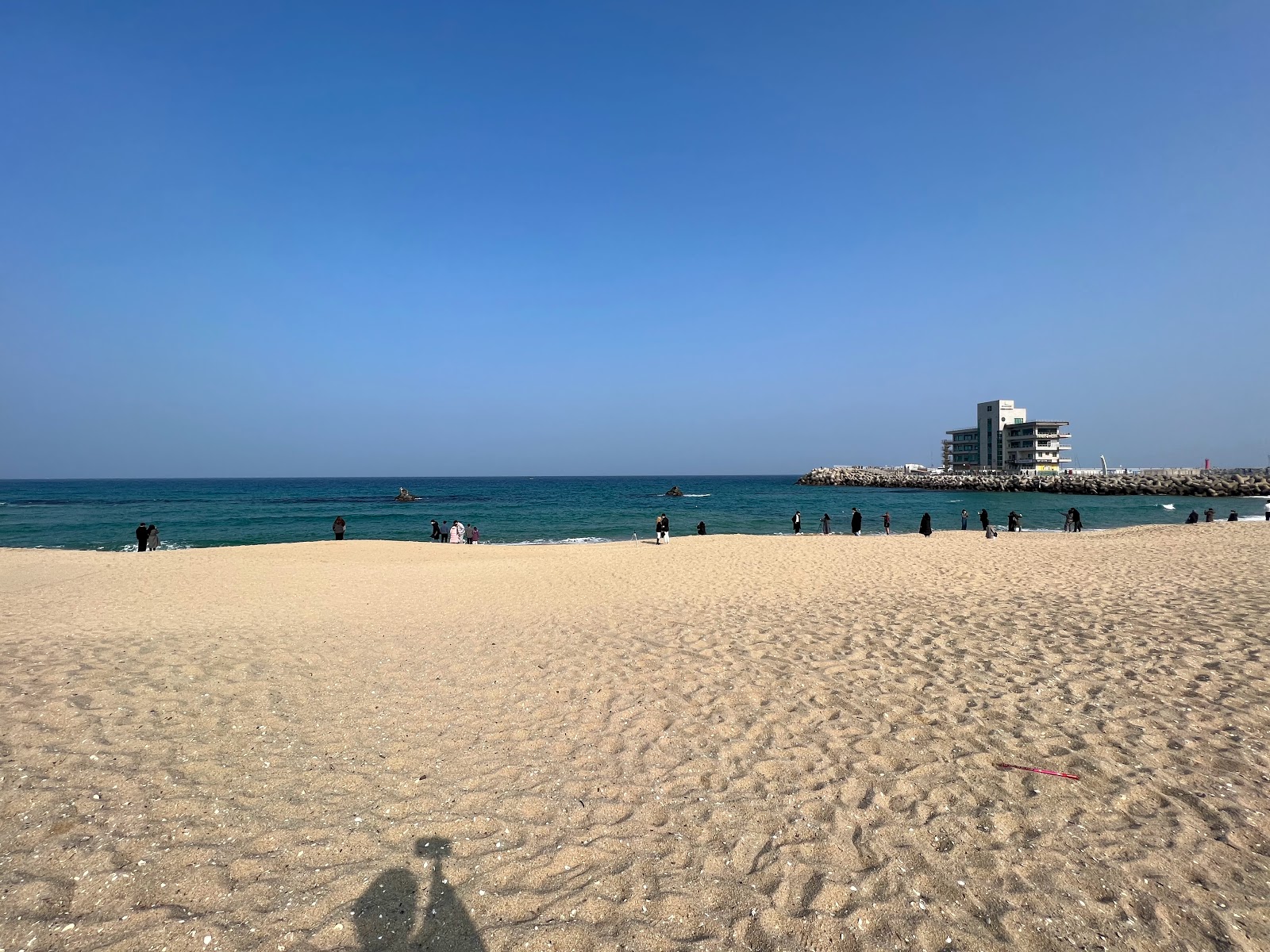 Valokuva Songjeong Beachista. - suositellaan perheen matkustajille, joilla on lapsia