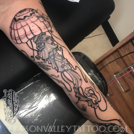 Explore cover up tattoo ideas on hip, creative tattoo ideas in Wappingers Falls, available at Hudson Valley Tattoo Company