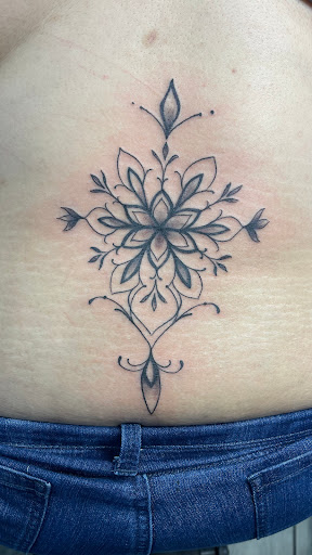 Explore unique tramp stamp tattoo ideas, creative tattoo ideas in Bakersfield, available at HomeMade Ink.