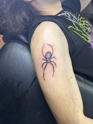 Explore triple moon finger tattoo ideas, creative tattoo ideas in Cocoa, available at Rorschach Tattoo Shop and Piercing Studio