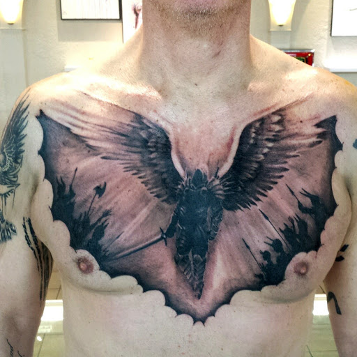 Find under the breast tattoo ideas for your next unique tattoo in Chicago at Royal Flesh Tattoo and Piercing
