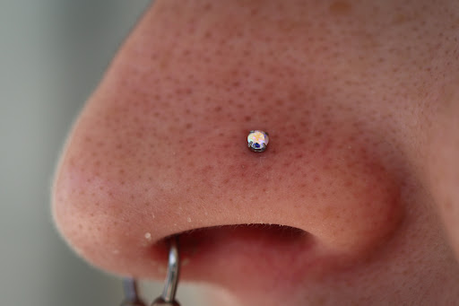 Explore trap tattoo ideas, creative tattoo ideas in West Palm Beach, available at Wooden Heart Tattoos and Piercings