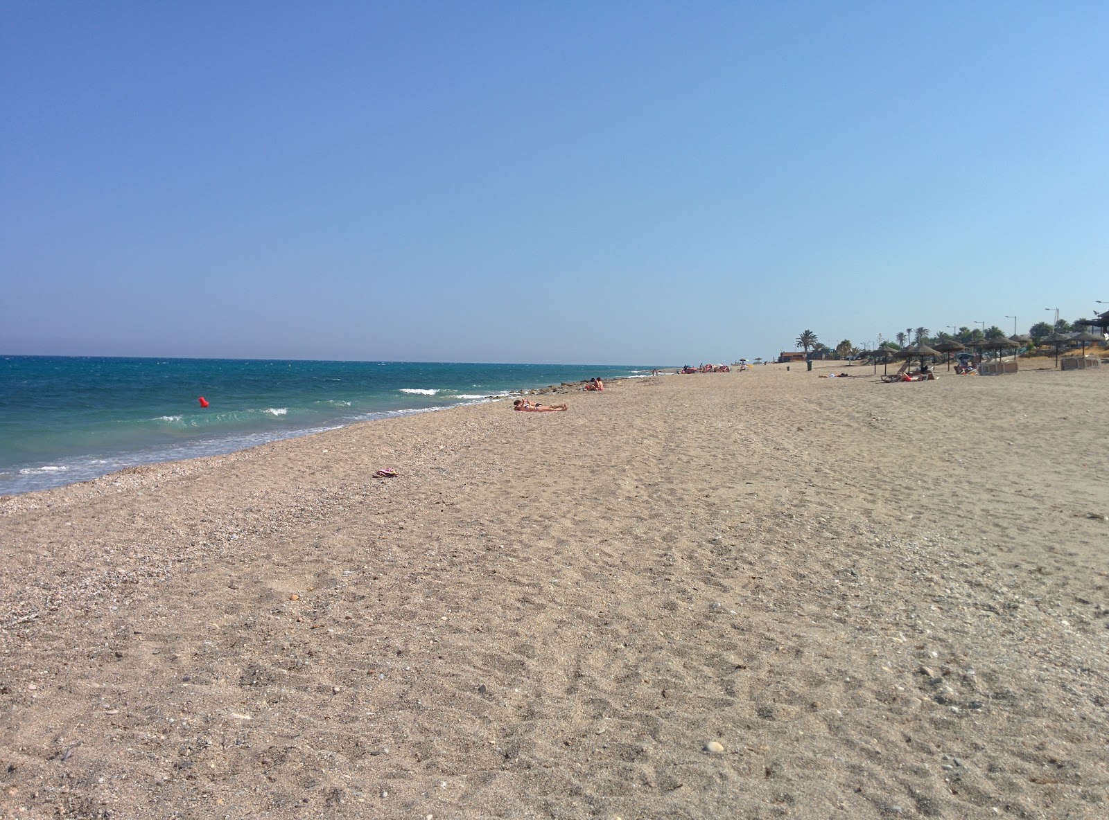Foto de Playa del descargador com areia de concha brilhante superfície