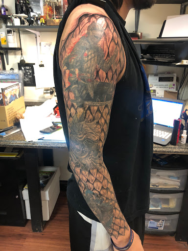Explore cosmic tattoo ideas, creative tattoo ideas in Alamosa, available at The Shop Tattoo & Comics