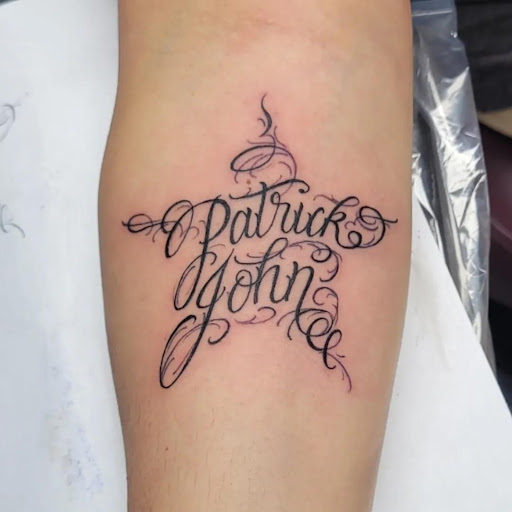 Explore cover up lower back tattoo ideas, creative tattoo ideas in Worcester, available at Elegance Piercing & Tattoo Inc.