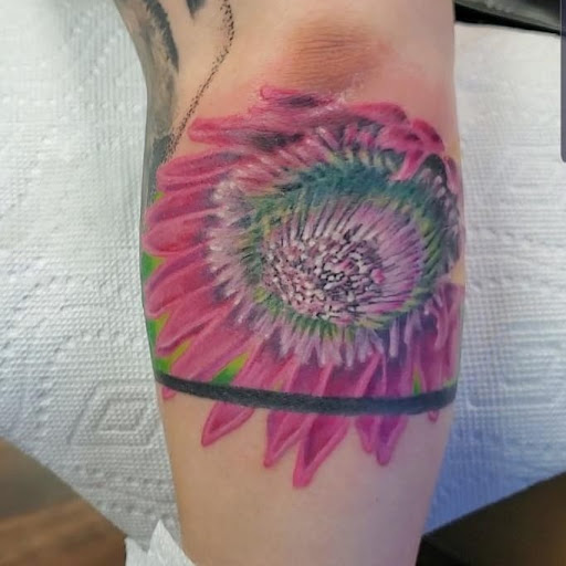 Explore tattoo cover up ideas for upper back, creative tattoo ideas in Reno, available at Evolution Tattoo