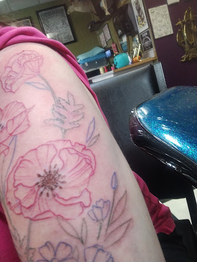 Explore surf tattoo ideas, creative tattoo ideas in Tacoma, available at Rolling Gypsy Tattoo