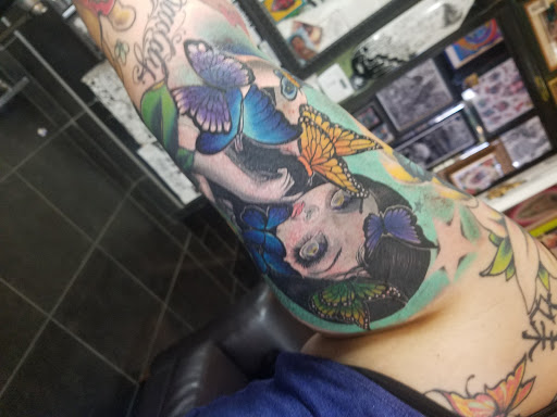 Find addams family tattoo ideas for your next unique tattoo in Albuquerque at Por Vida Tattoo