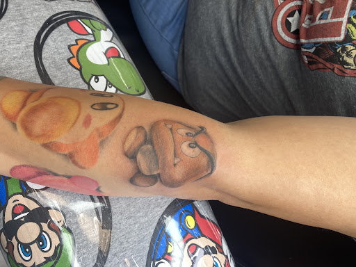 Explore small color tattoo ideas, creative tattoo ideas in Daytona Beach, available at Studio 21 Tattoo & Piercings Daytona Beach