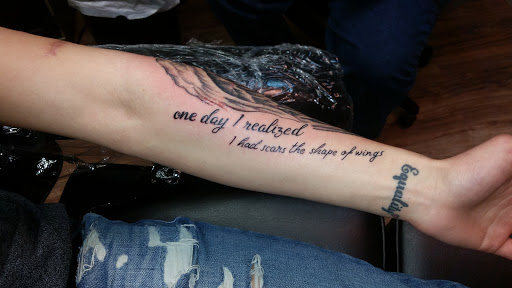 Explore spark plug tattoo ideas, creative tattoo ideas in Barre, available at Bury The Needle Tattoo