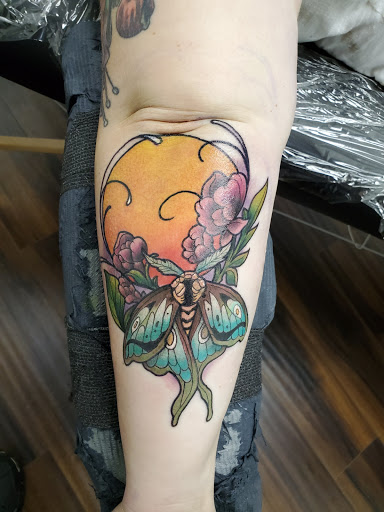 Explore angel tattoo ideas, creative tattoo ideas in Buford, available at Inked Arts Tattoo Studio