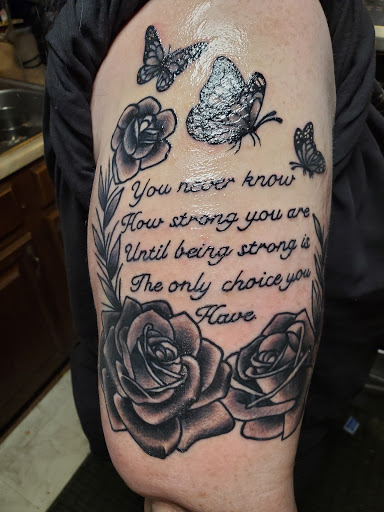 Explore foot tattoo ideas male, creative tattoo ideas in Canton, available at Bound For Glory Ink Tattoo Company