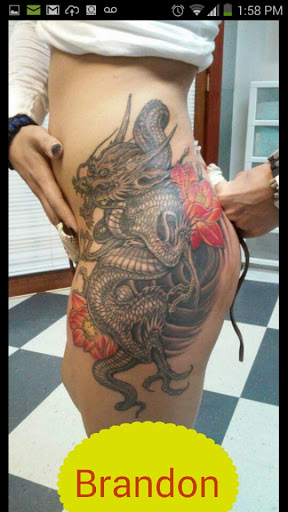 Explore axe tattoo ideas, creative tattoo ideas in Asheville, available at Aacross The Skin Tattoo Shop