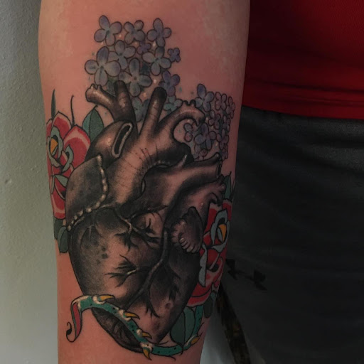 Explore belle tattoo ideas, creative tattoo ideas in Clinton, available at Black Relic Tattoo