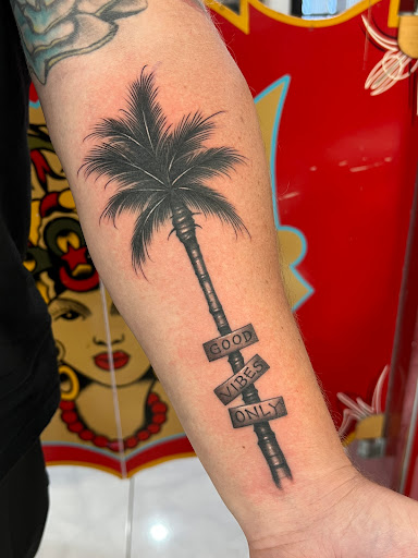 Explore female tattoo ideas for lower back, creative tattoo ideas in Honolulu, available at Sacred Art Tattoo Waikiki
