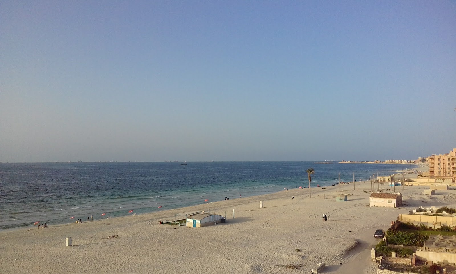 Fotografija Aziz Market Beach z turkizna čista voda površino