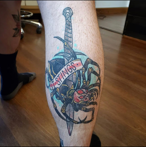 Explore simple spine tattoo ideas, creative tattoo ideas in Columbus, available at Lacquer Gallery TATTOO