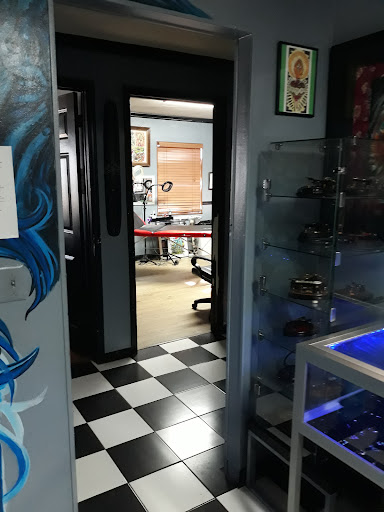 Explore tattoo ideas guns, creative tattoo ideas in Jacksonville, available at Cover Up Tattoos