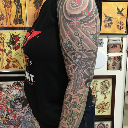 Explore trapezius tattoo ideas, creative tattoo ideas in Dallas, available at Carl Hallowell, Horisho