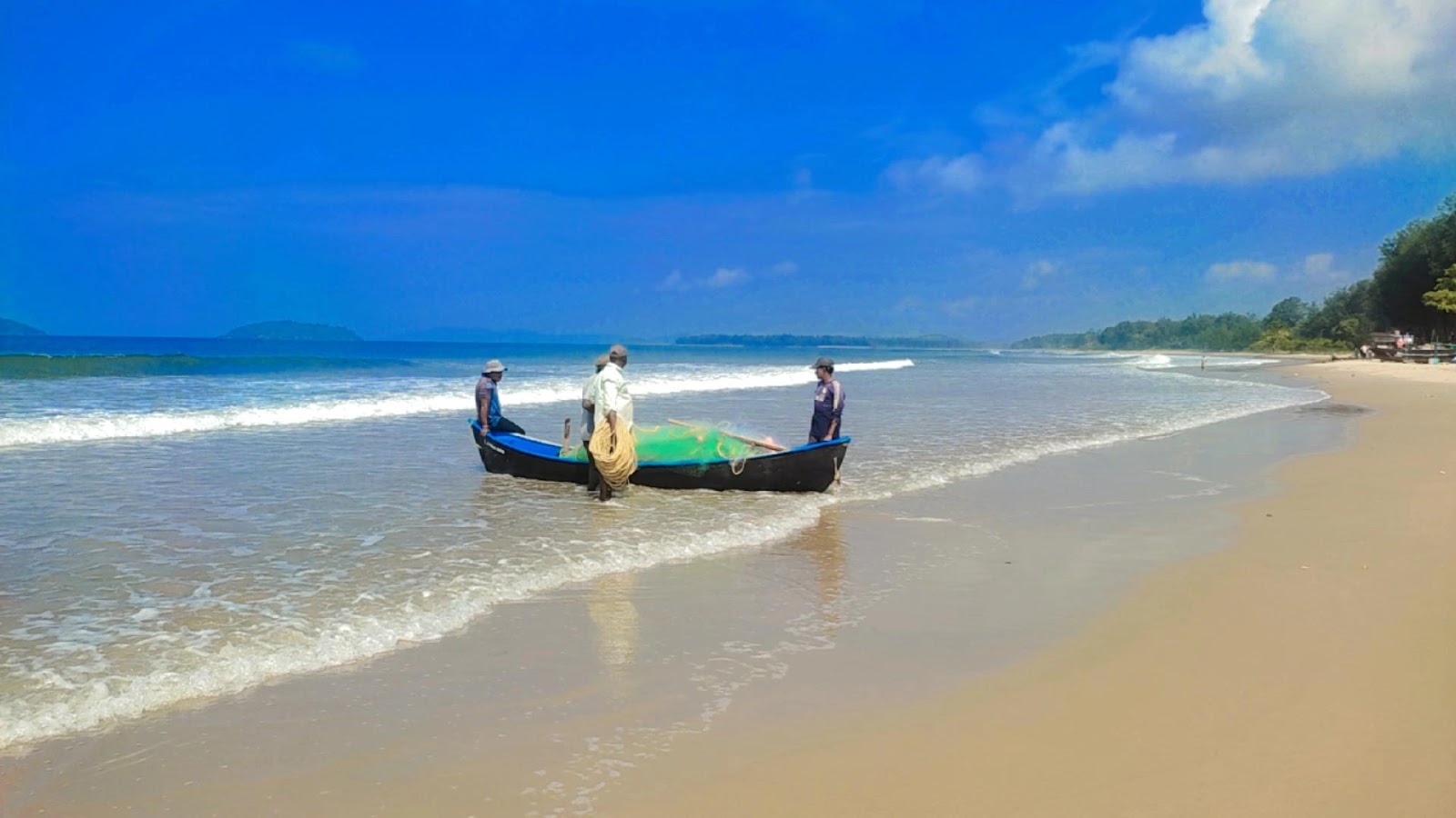 Fotografija Rabindranath Tagore Beach z svetel pesek površino