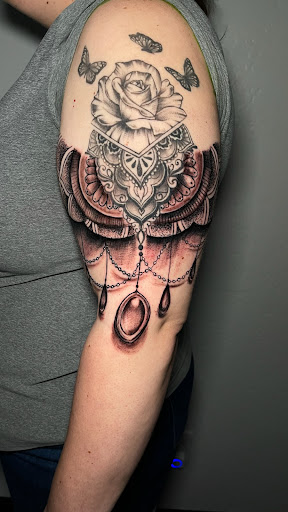 Explore falcon tattoo ideas, creative tattoo ideas in Glendale, available at Black Raven Tattoo