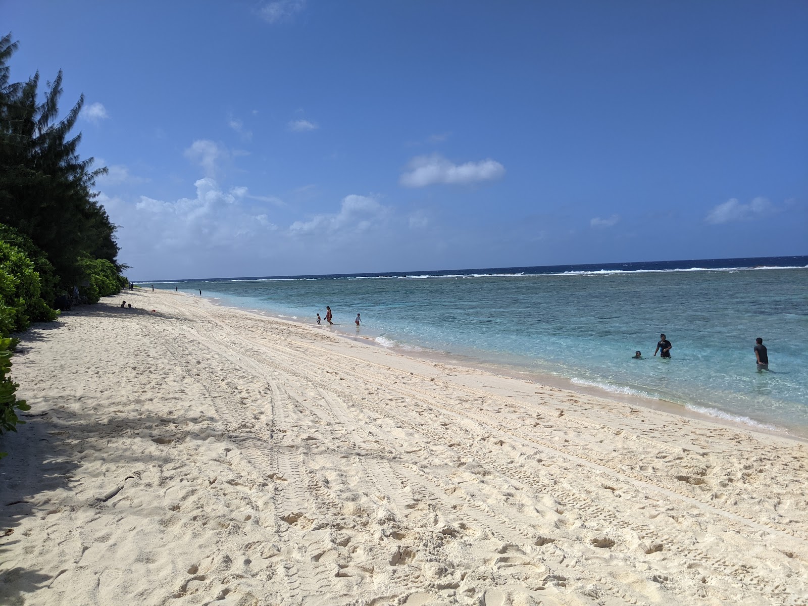 Foto van Ritidian Beach met recht en lang