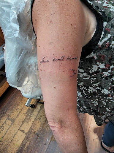 Explore fine line hand tattoo ideas, creative tattoo ideas in Waterloo, available at Cedar Valley Tattoo & Piercing Studio