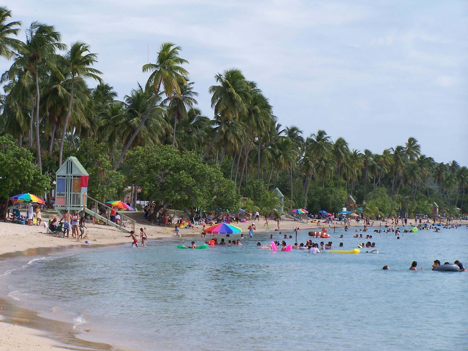 Photo de Playa Tanga avec l'eau cristalline de surface