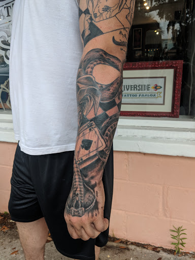 Explore leg sleeve tattoo ideas for men, creative tattoo ideas in Savannah, available at Riverside Tattoo Parlor