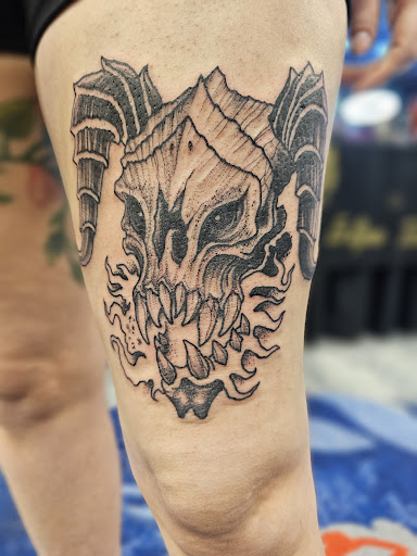 Explore fist bump tattoo ideas, creative tattoo ideas in Fort Myers, available at HOWL Tattoo & Piercing