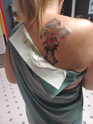 Explore name cover up tattoo ideas, creative tattoo ideas in Foley, available at Black Sheep Custom Tattoos and Piercings