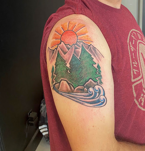 Explore red hand tattoo ideas, creative tattoo ideas in Buena Vista, available at Ivy League Tattoo Studio