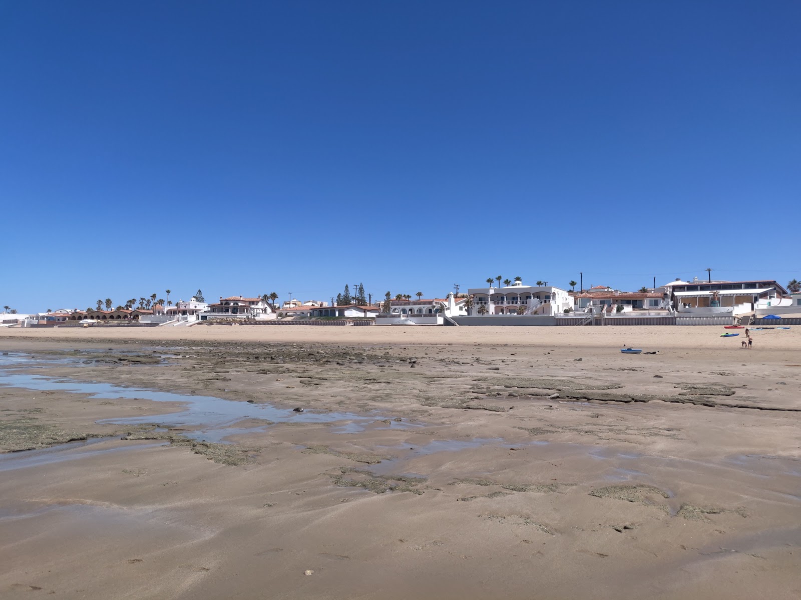 Foto de Playa Del Este com linha costeira longa e reta