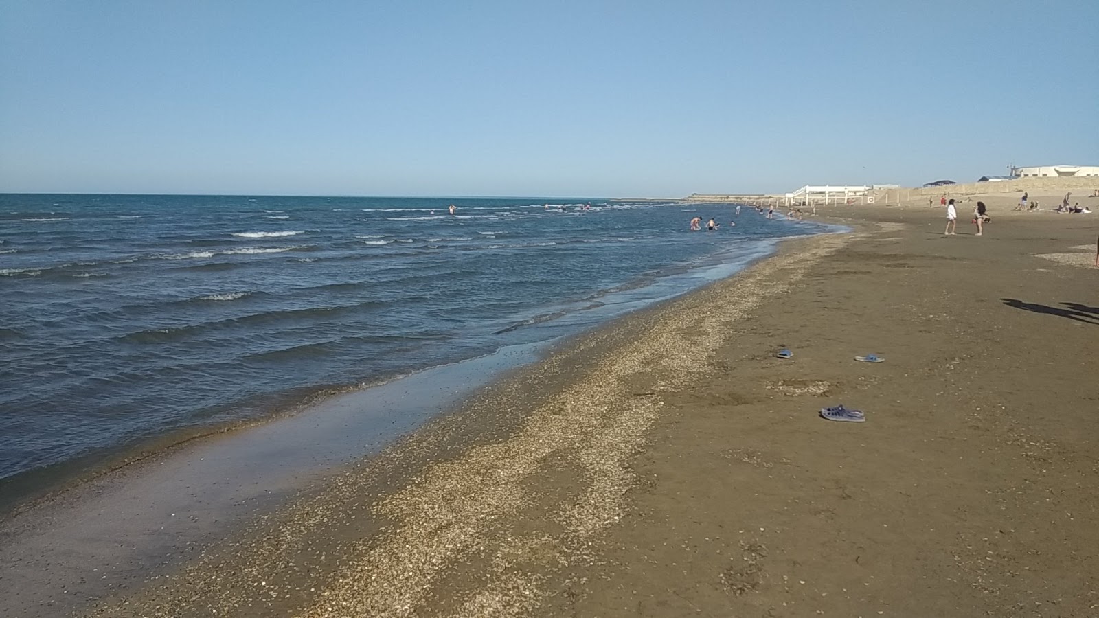 Foto de FHN Beach com areia brilhante superfície