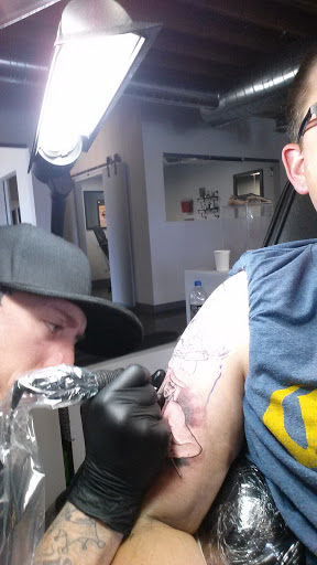 Explore feminine back tattoo ideas, creative tattoo ideas in Colorado Springs, available at Fallen Heroes Tattoo & Piercing (Colorado)