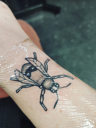 Explore cycling tattoo ideas, creative tattoo ideas in Sioux City, available at Living Art Tattoo Studio