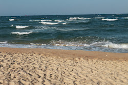Φωτογραφία του Nhat Le Beach - δημοφιλές μέρος μεταξύ λάτρεις της χαλάρωσης