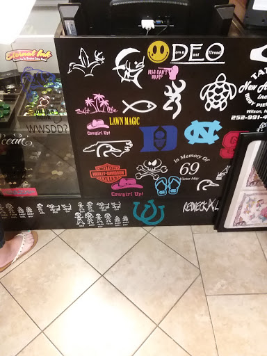 Explore medium sized tattoo ideas, creative tattoo ideas in Wilson, available at New Addiction Tattoos